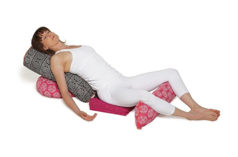 A meditation practitioner demonstrating  the use of meditation cushions